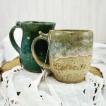 two handmade mugs