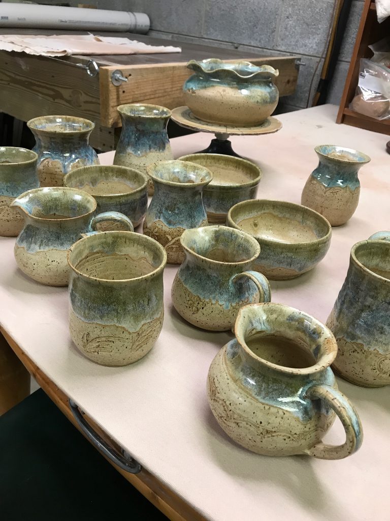 assorted pottery in bamboo and seaspray glaze